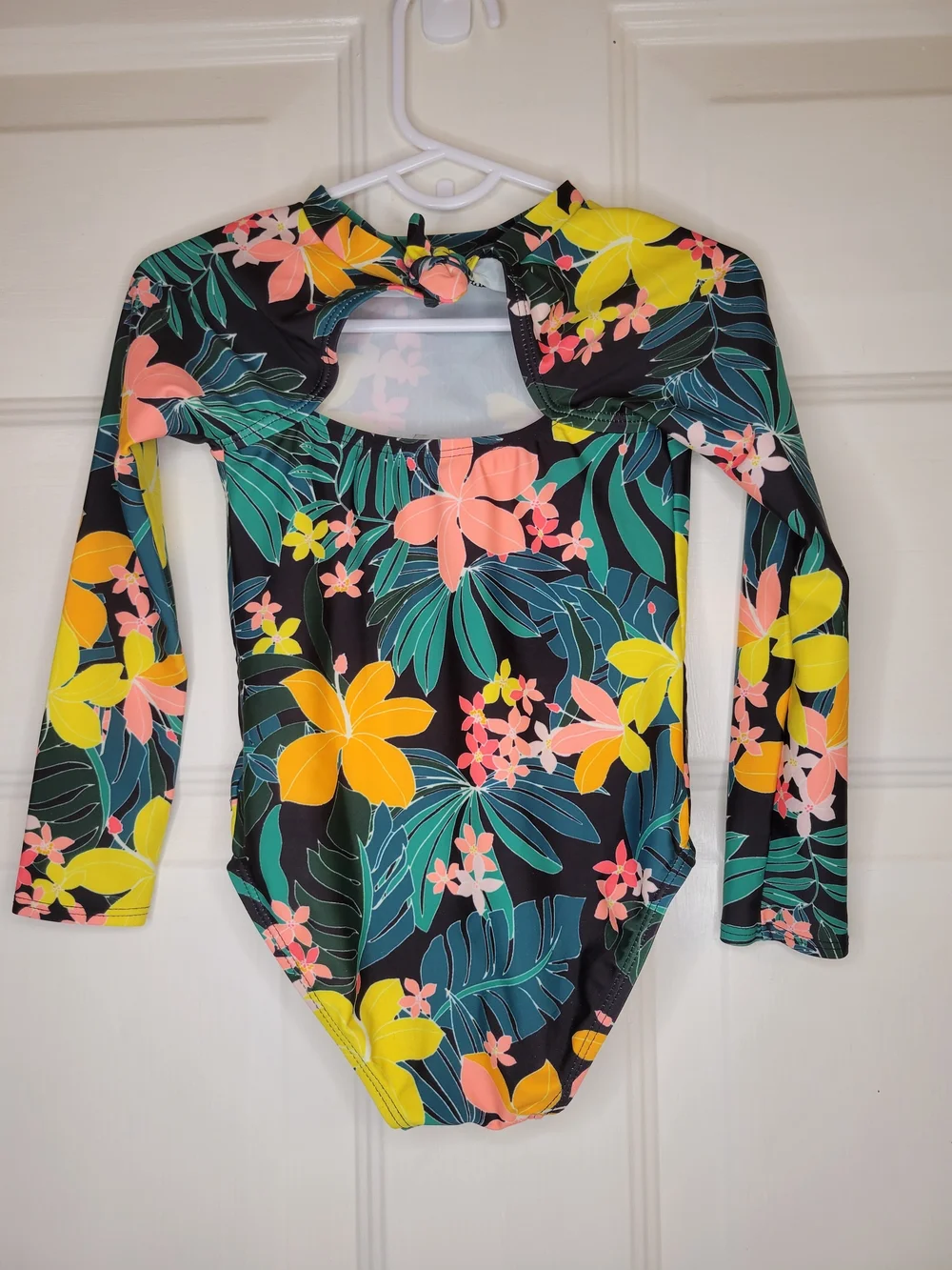 Old Navy toddler girl's long-sleeve, one-piece swimsuit featuring a black floral - Picture 5 of 6